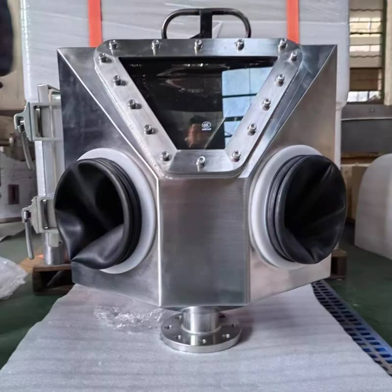 Glove box feeder showing N₂ purge port, viewing window, glove ports, and bottom discharge flange